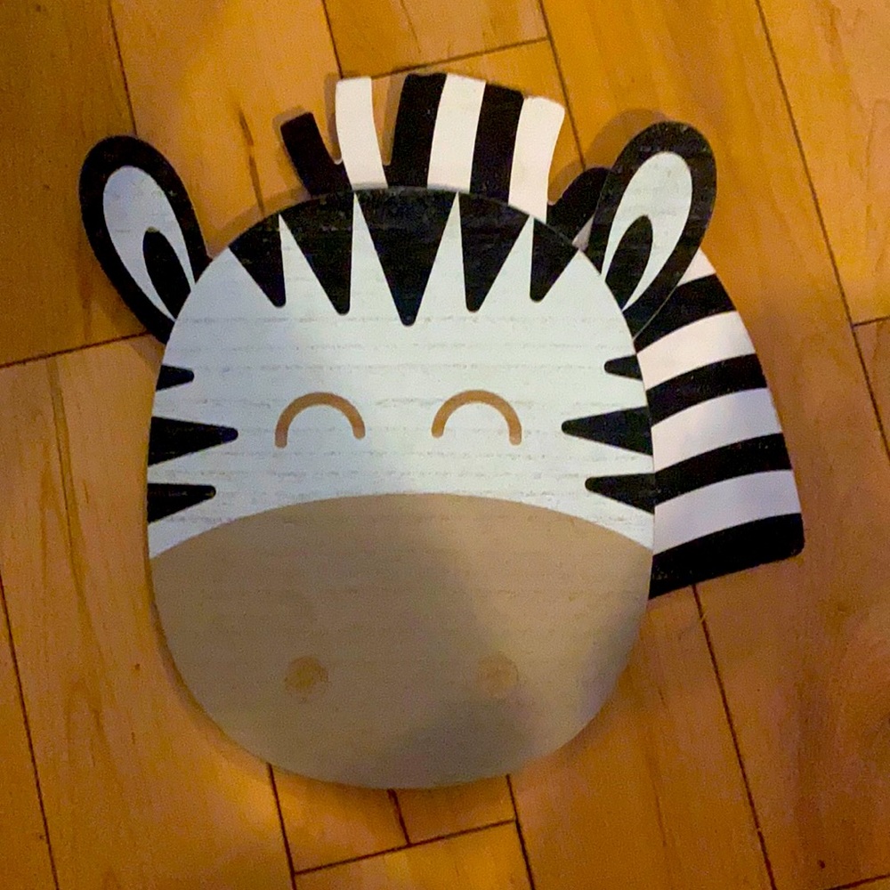 New with tags never used, I also have two other animals that match zebra decor